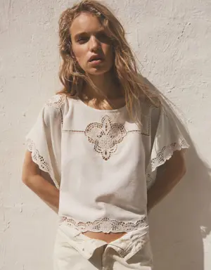Embroidered openwork blouse