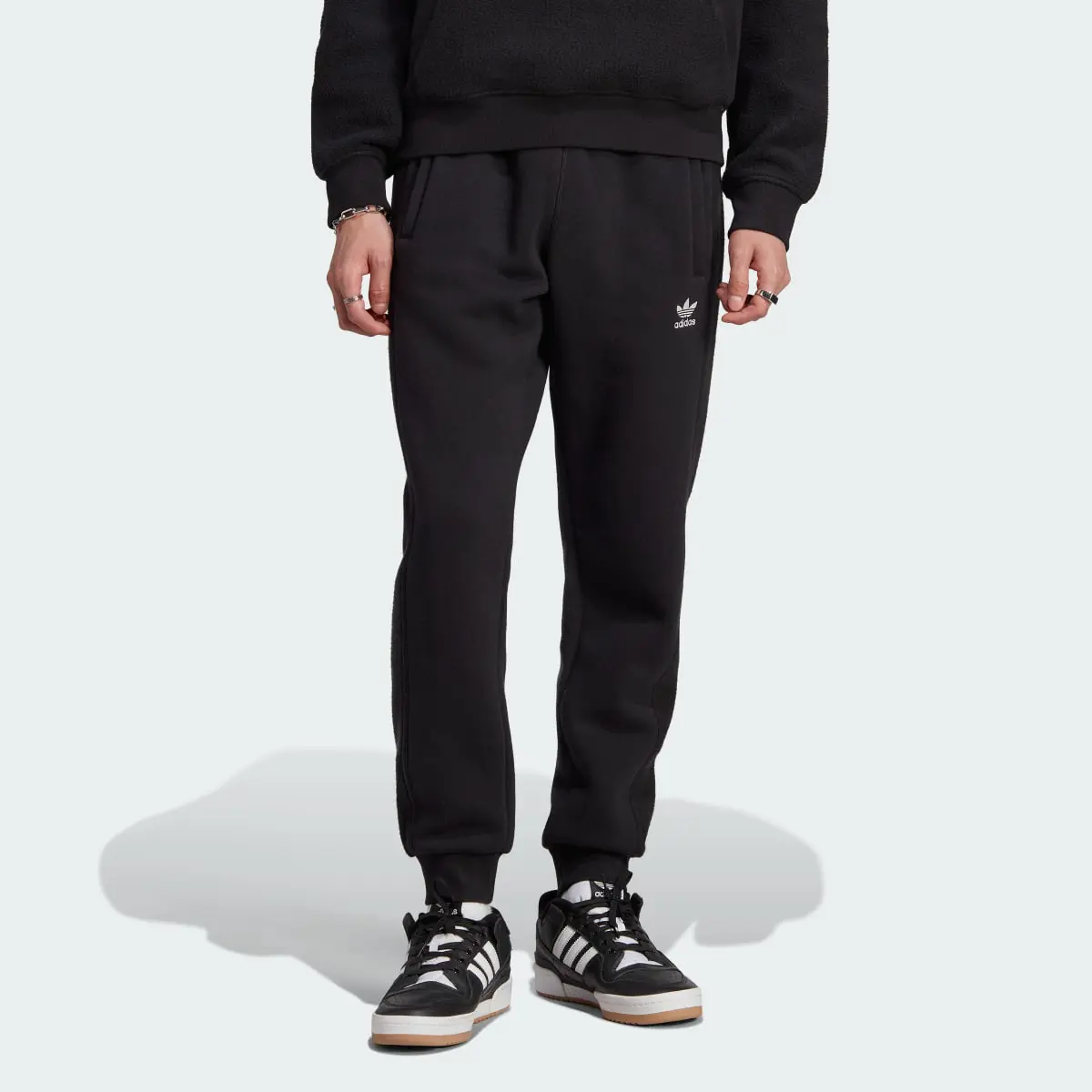 Adidas Trefoil Essentials+ Reverse Material Sweat Pants. 1