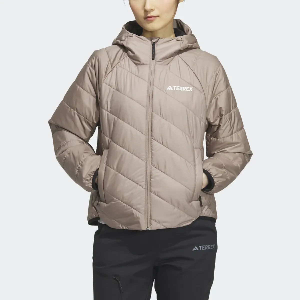 Adidas Lightweight Padded Jacke. 1