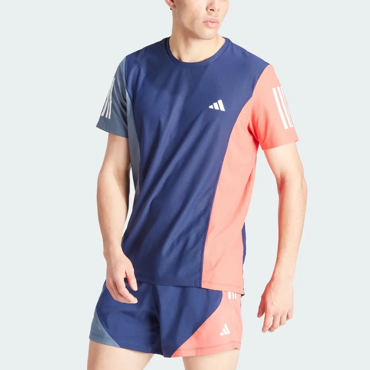 Adidas Playera Own The Run Colorblock. 1