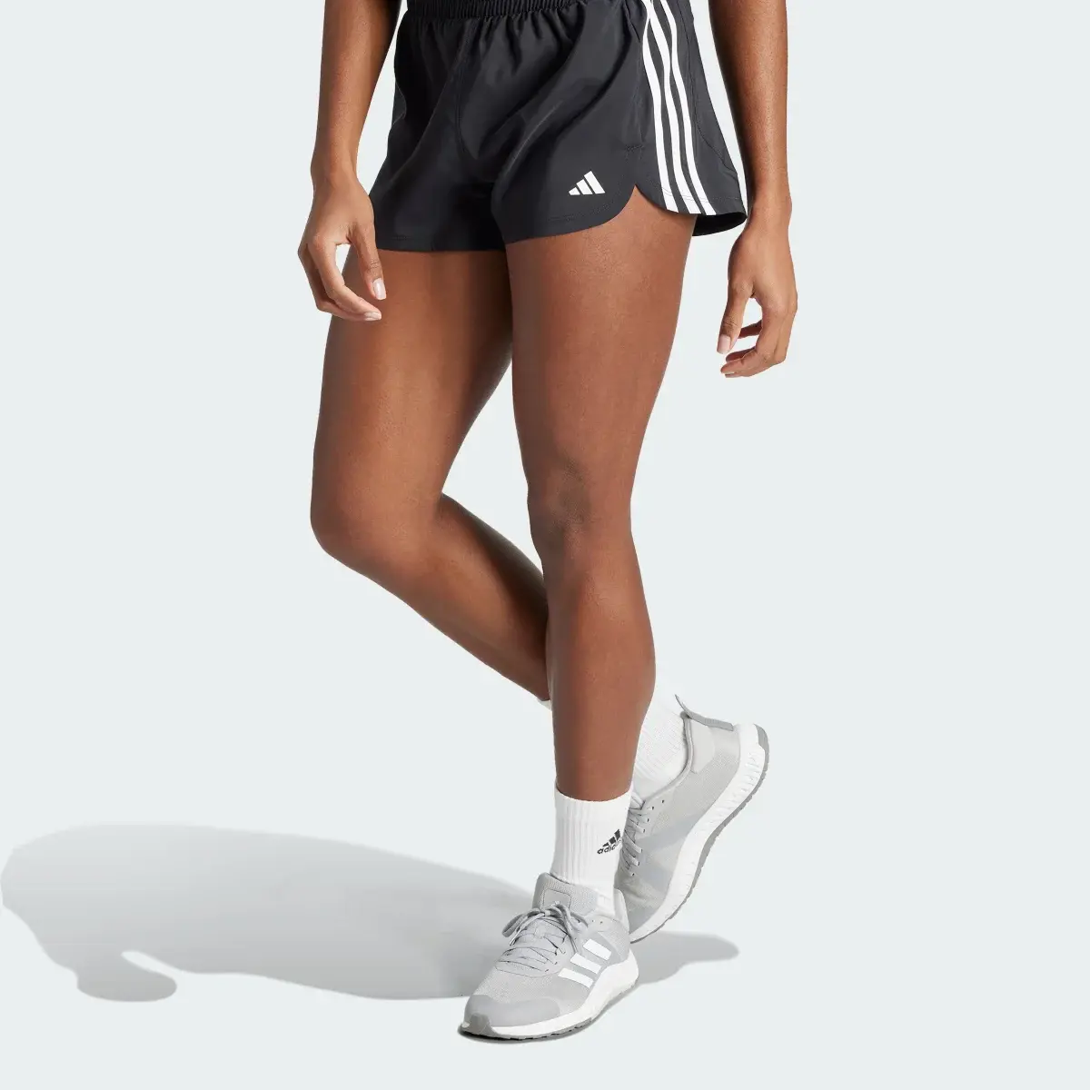 Adidas Pacer Training 3-Stripes Woven Mid-Rise Shorts. 1