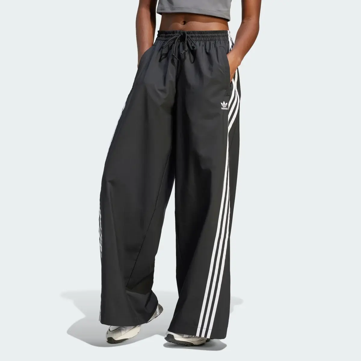 Adidas Adilenium Oversized Tracksuit Bottoms. 1