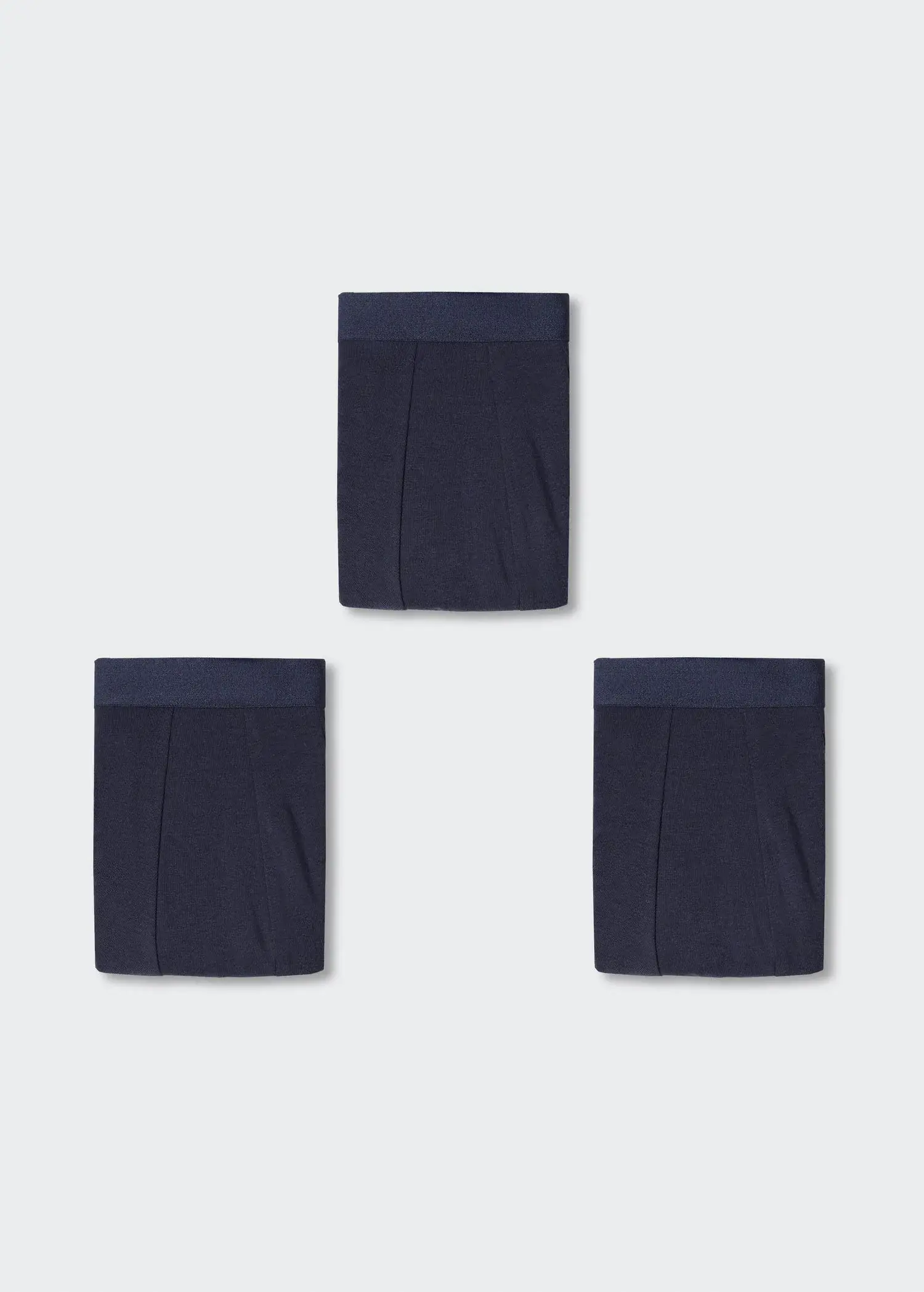 Mango 3-pack of blue cotton boxer shorts. a set of three pairs of black boxers hanging on a wall. 