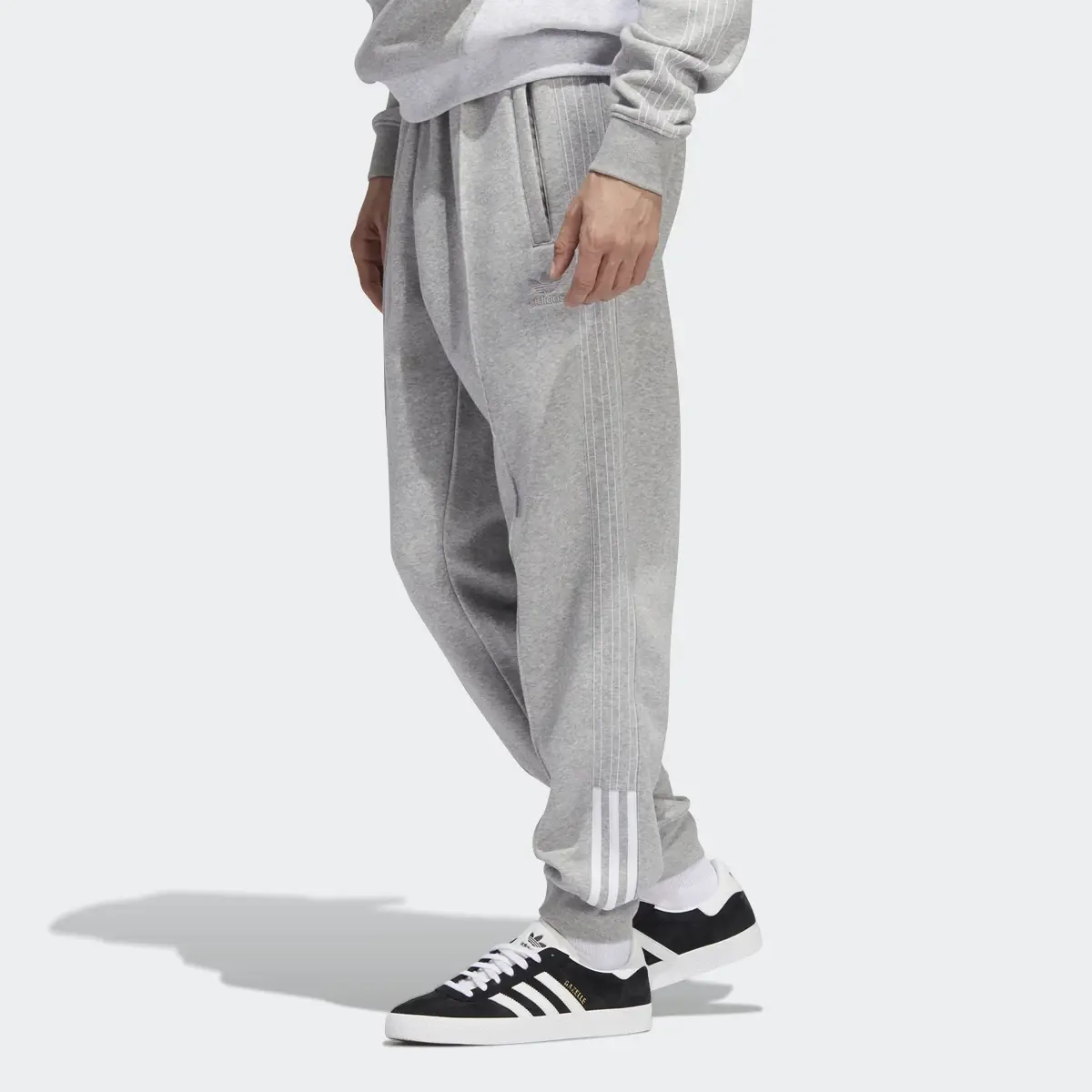 Adidas Fleece SST Track Pants. 1