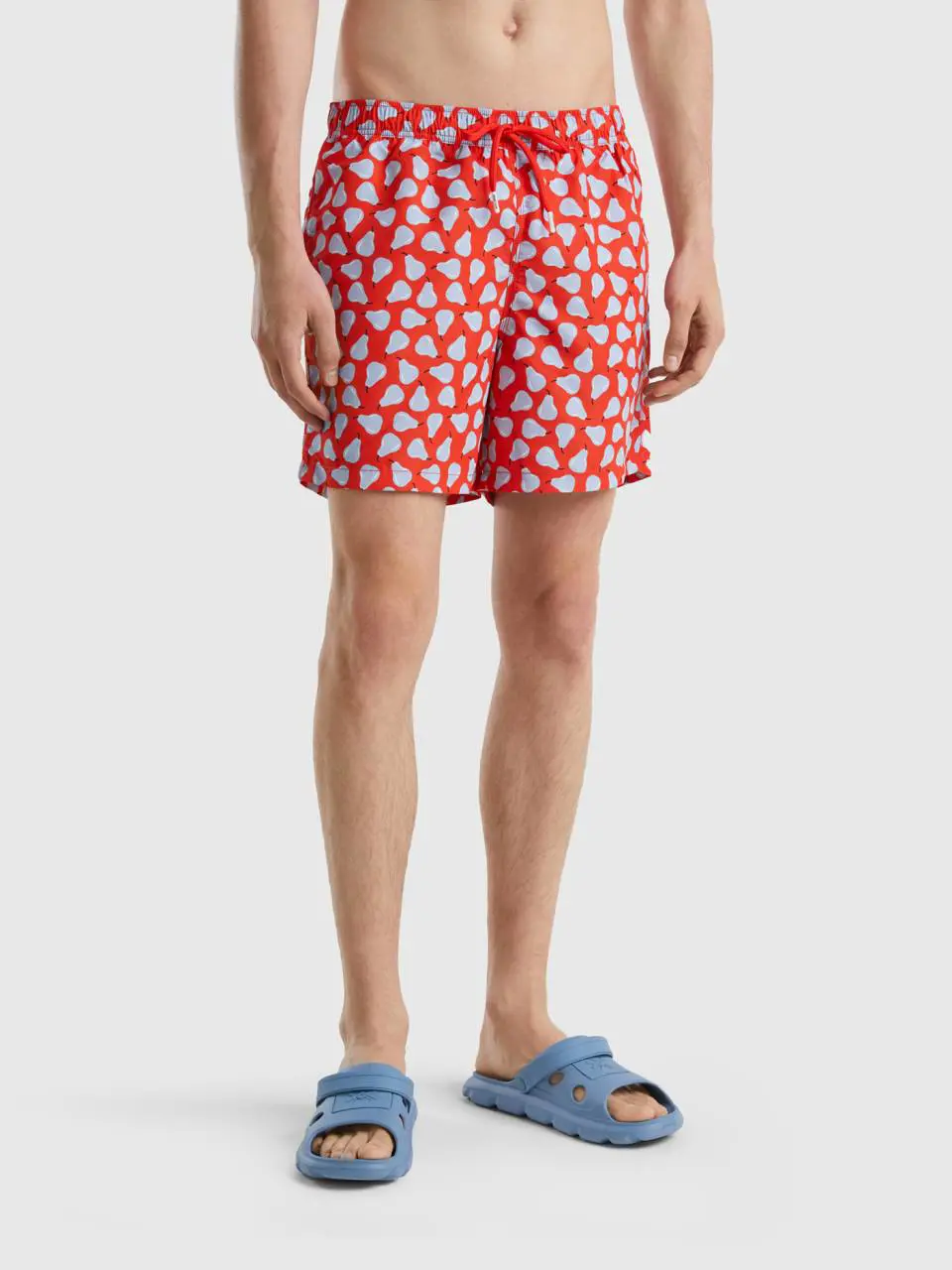 Benetton red swim trunks with pear pattern. 1