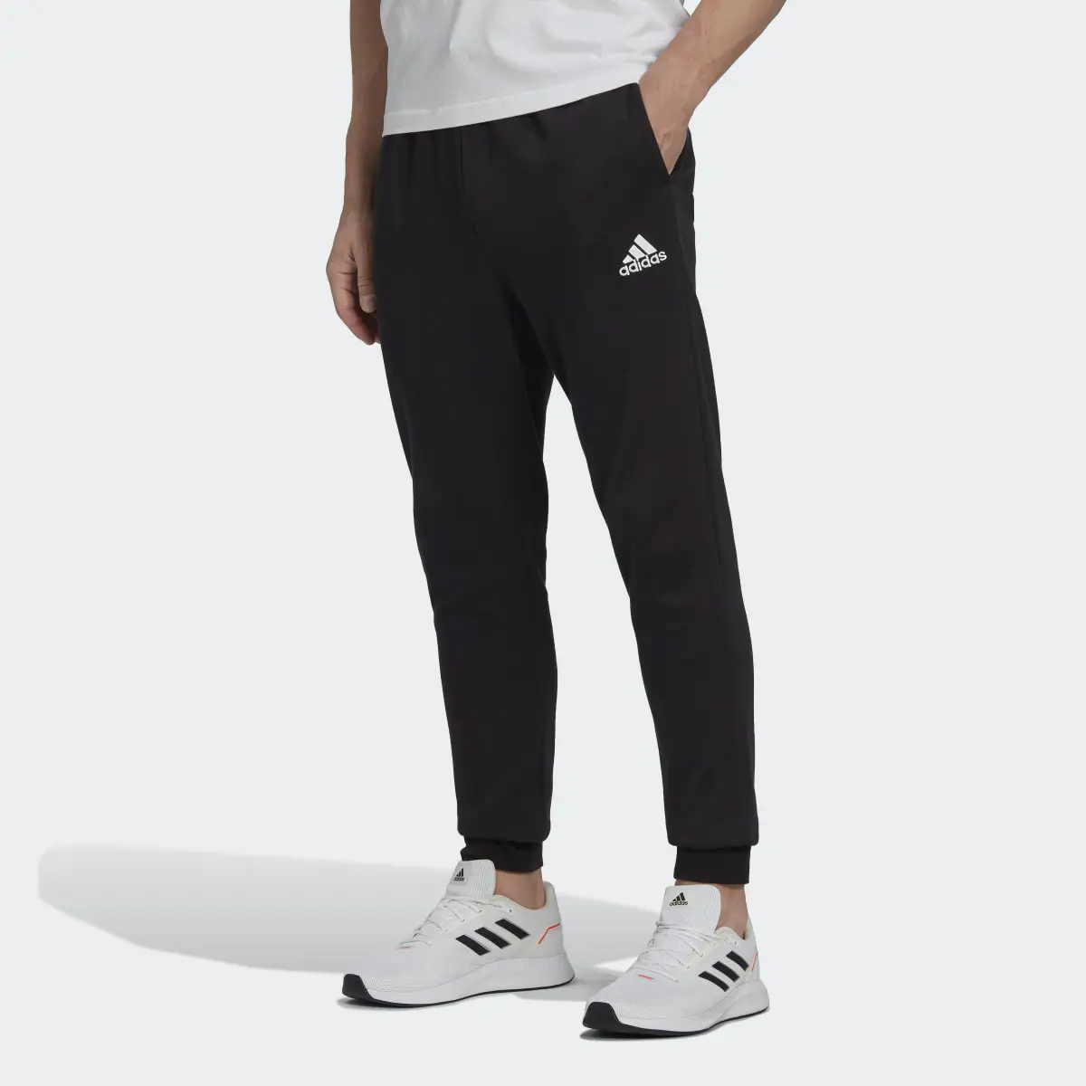 Adidas Essentials Fleece Regular Tapered Joggers. 1