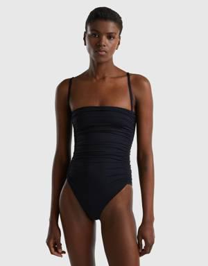 one-piece swimsuit in econyl® with draping