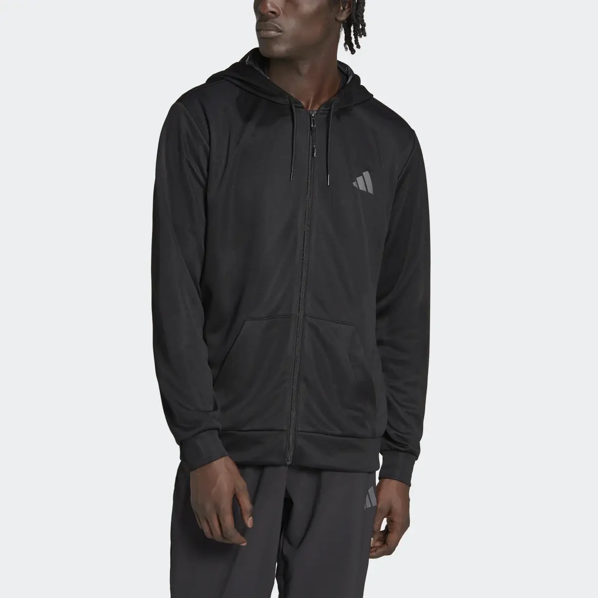 Adidas Veste entièrement zippée Train Essentials Seasonal Training. 1