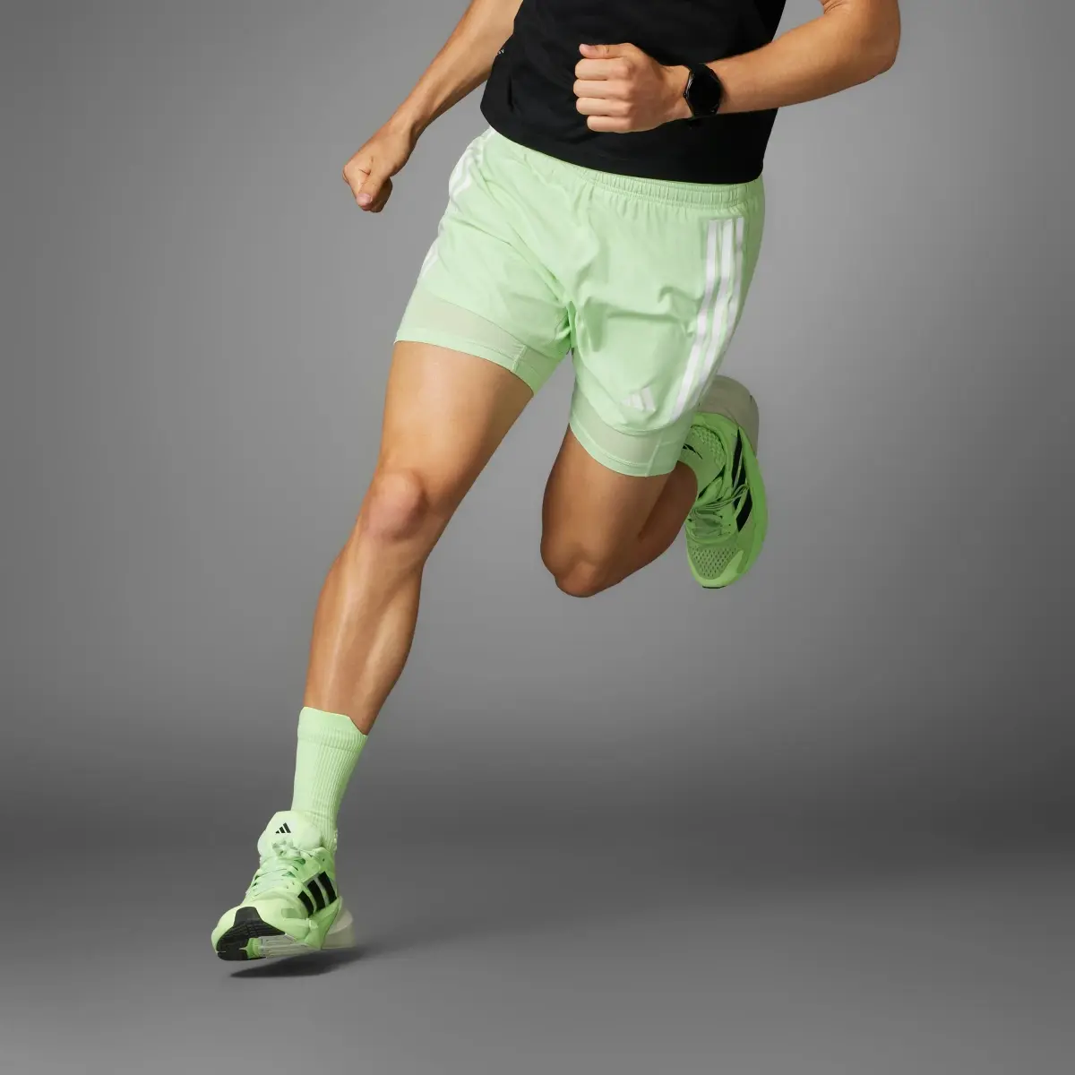 Adidas Own the Run 3-Stripes 2-in-1 Shorts. 1