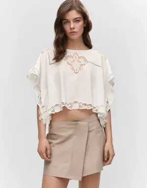Embroidered openwork blouse