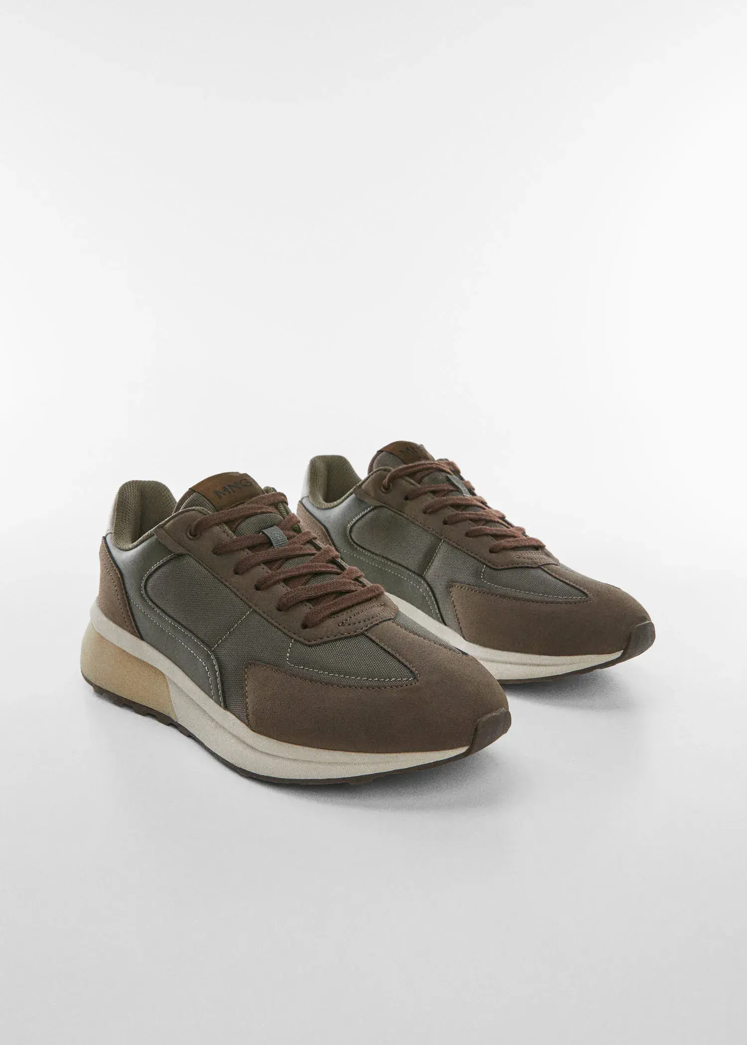 Mango Leather mixed sneakers. a pair of shoes that are sitting on the ground. 