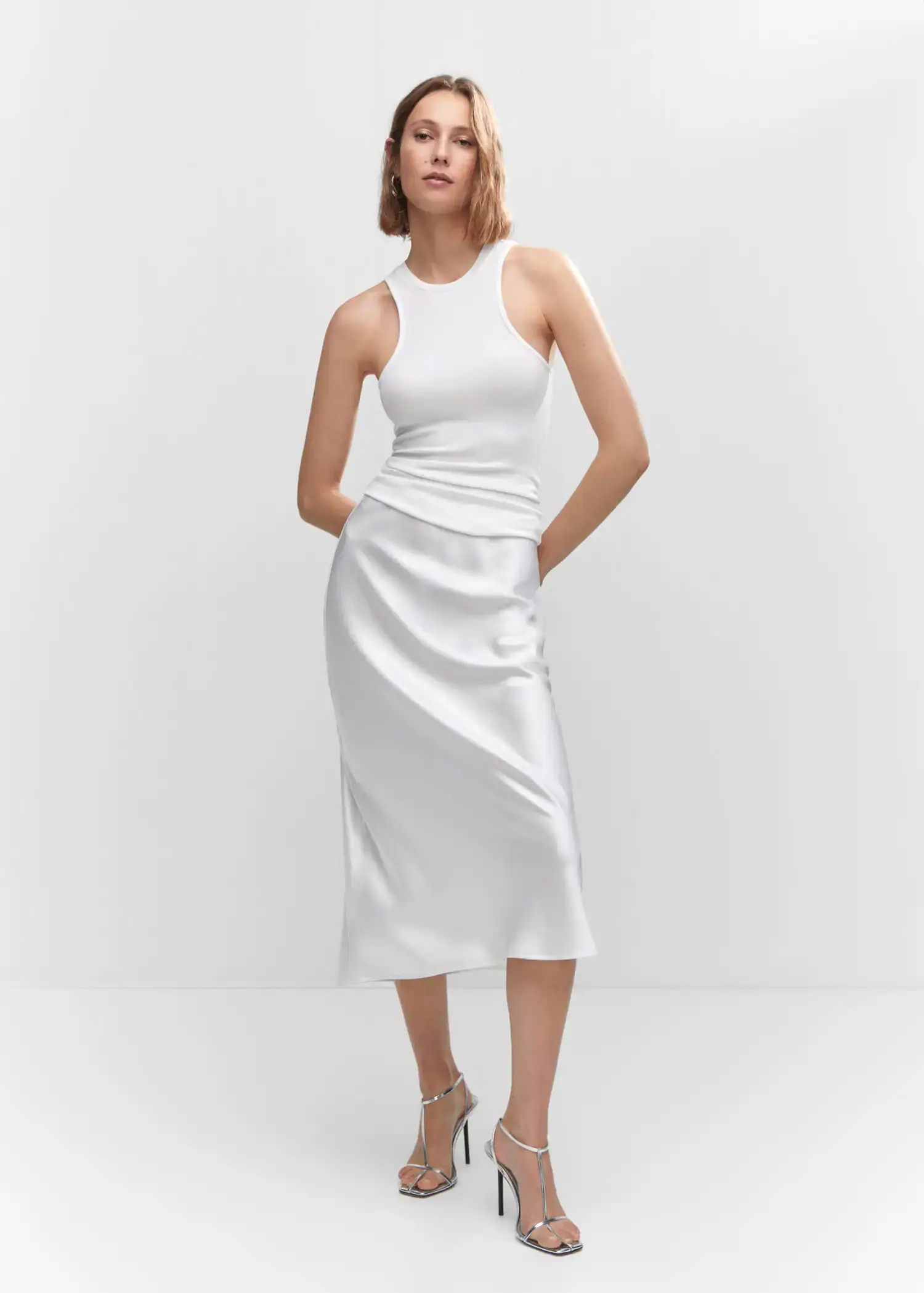 Mango Ribbed strap top. a woman in a white dress posing for a picture. 
