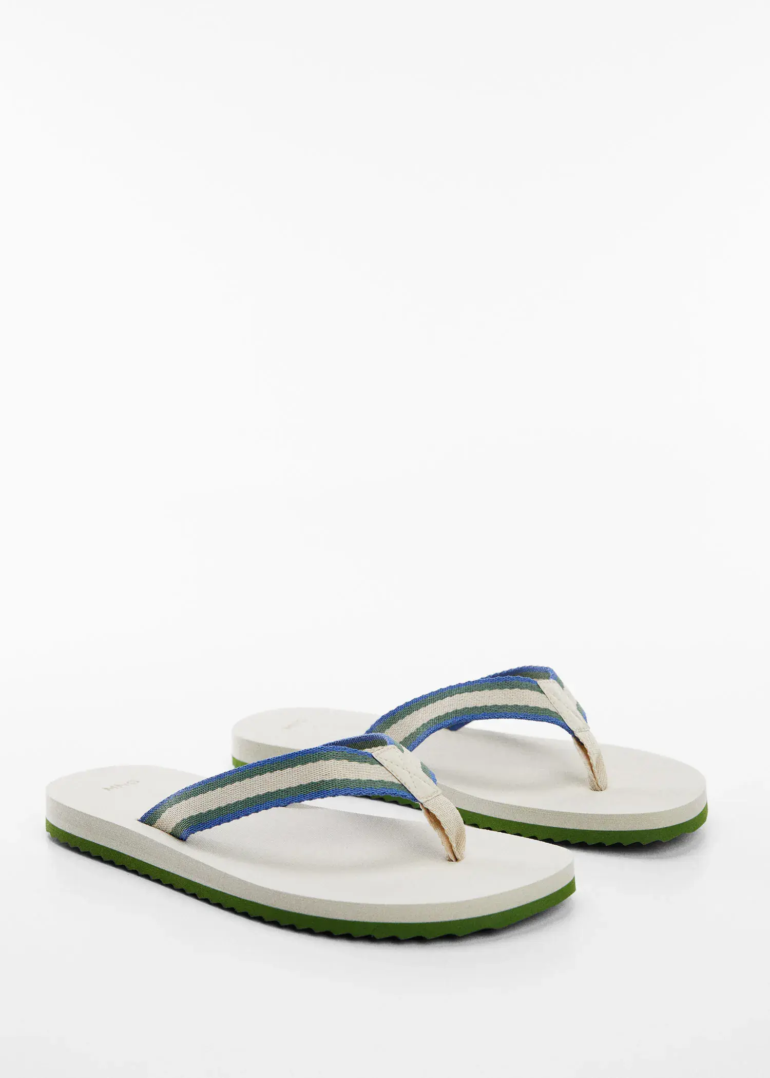 Mango Flip-flops with contrasting colour straps. a pair of flip flops sitting on top of a white surface. 