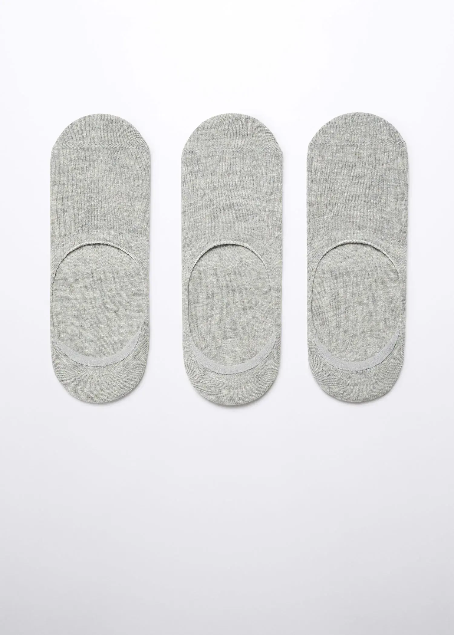Mango 3-pack of invisible socks. a group of three pairs of foot pads on a white surface. 
