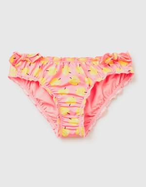 pink swim bottoms with apple pattern