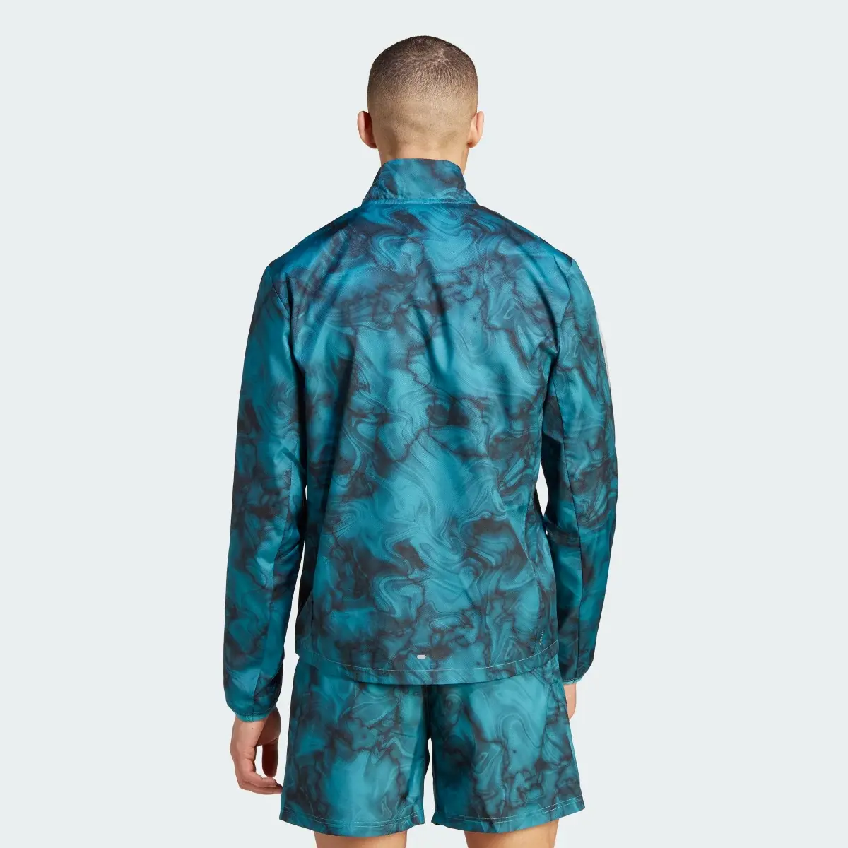 Adidas Own the Run Allover Print Jacket. 3