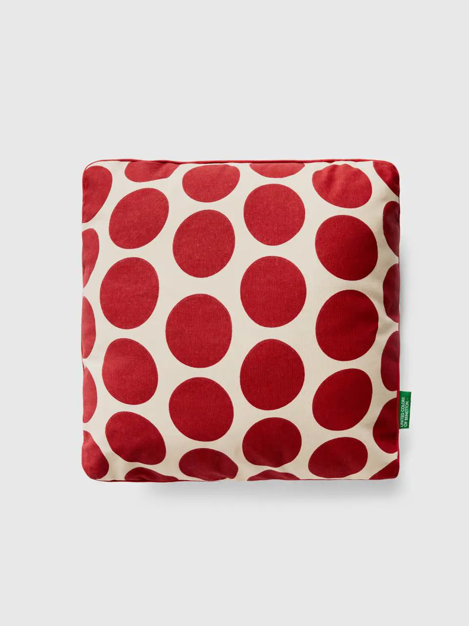 Benetton square pillow with red polka dots. 1