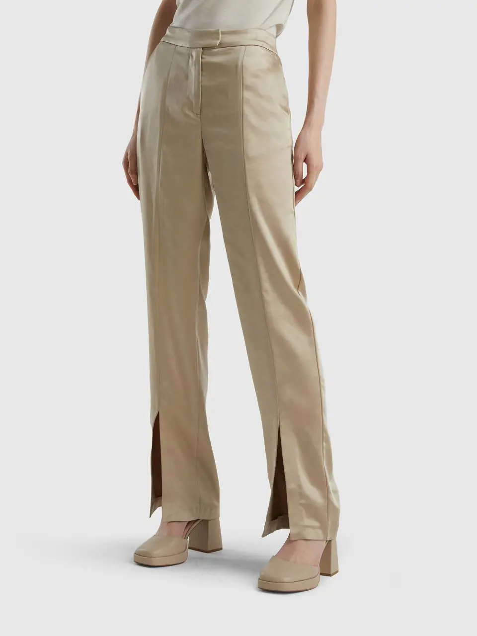 Benetton satin look trousers with slit. 1