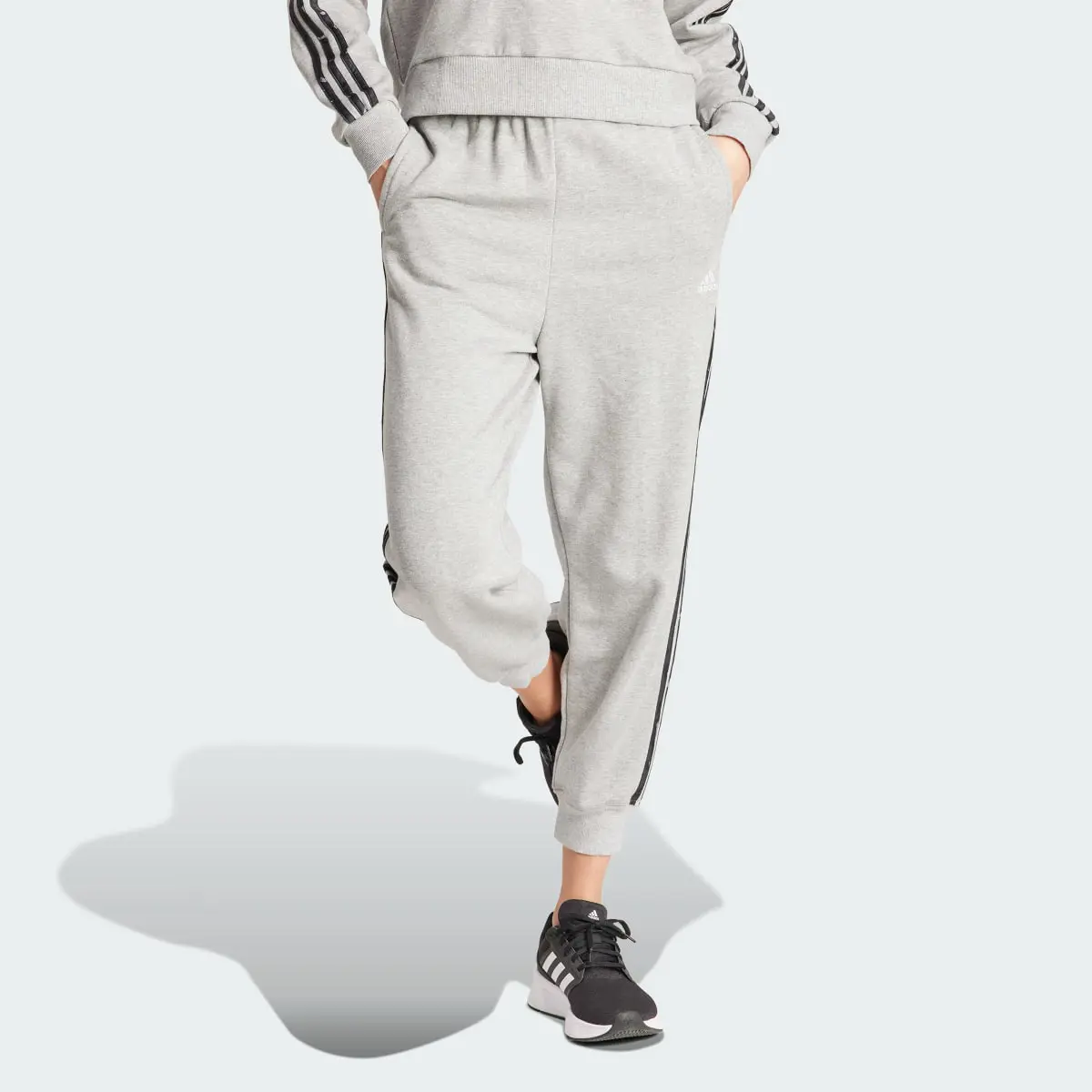 Adidas Essentials 3-Stripes Animal-Print 7/8 Joggers. 1