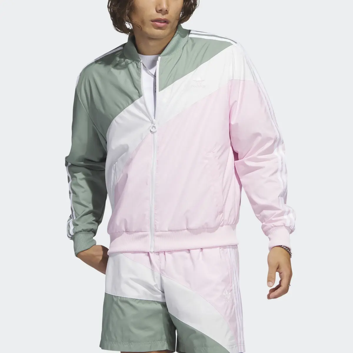 Adidas Swirl Woven Track Jacket. 1