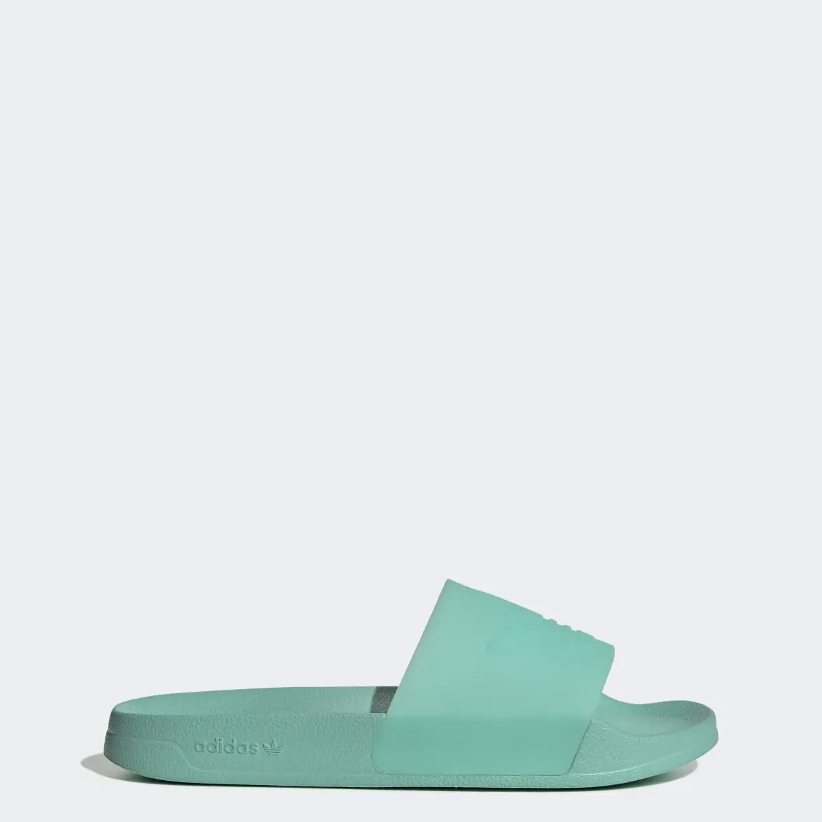 Adidas Claquette Adilette. 1