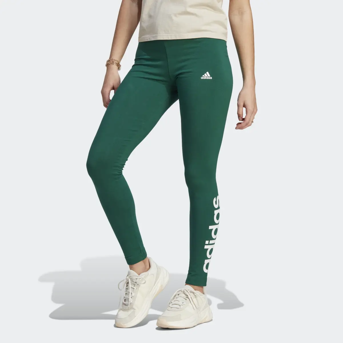 Adidas ESSENTIALS HIGH-WAISTED LOGO LEGGINGS. 1