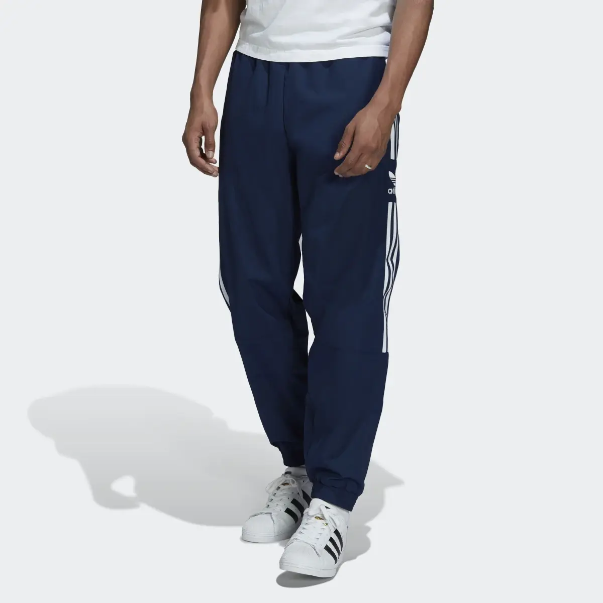 Adidas Adicolor Classics Lock-Up Trefoil Track Pants. 1