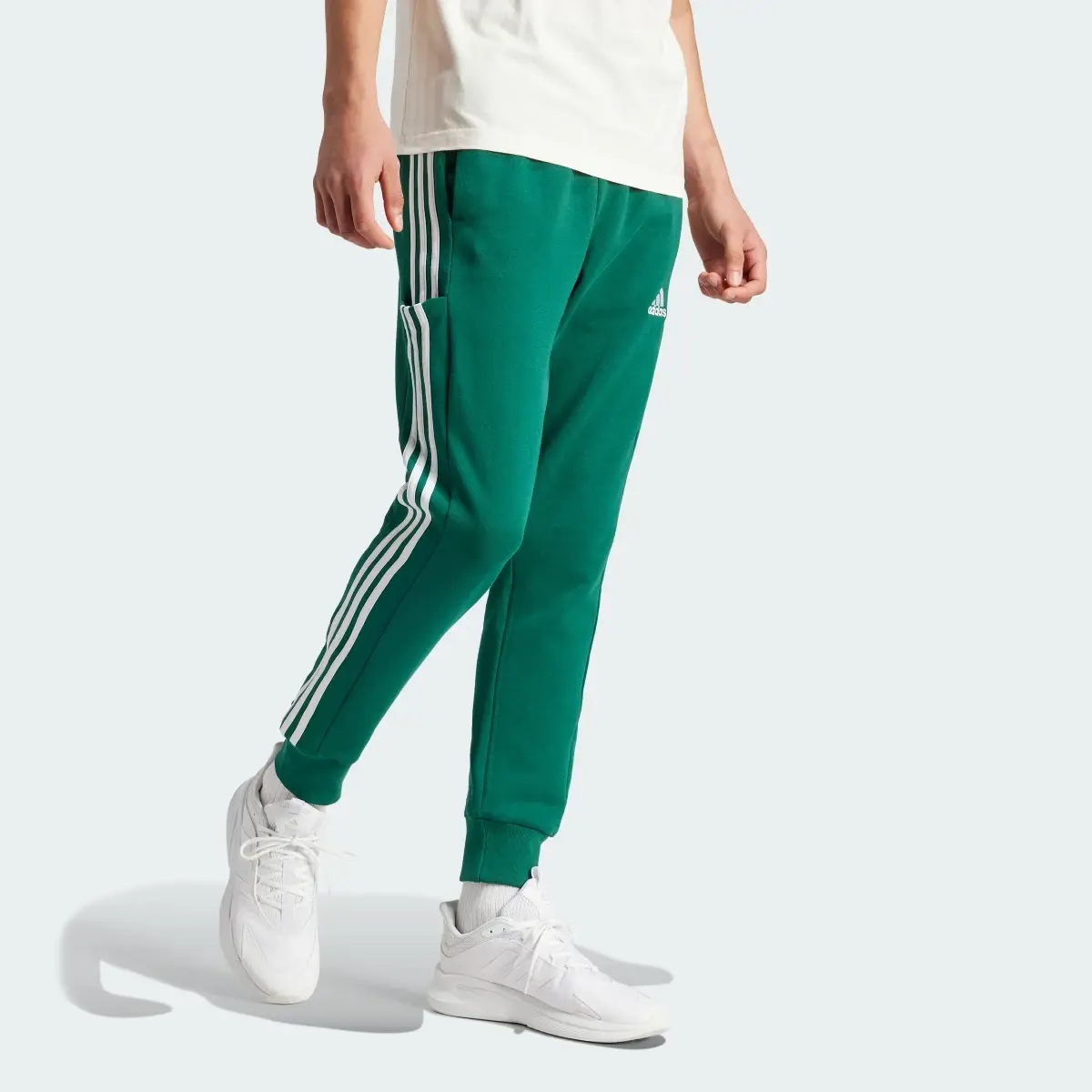 Adidas Essentials French Terry Tapered Cuff 3-Streifen Hose. 3