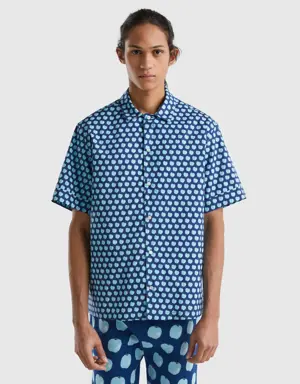 blue shirt with apple pattern