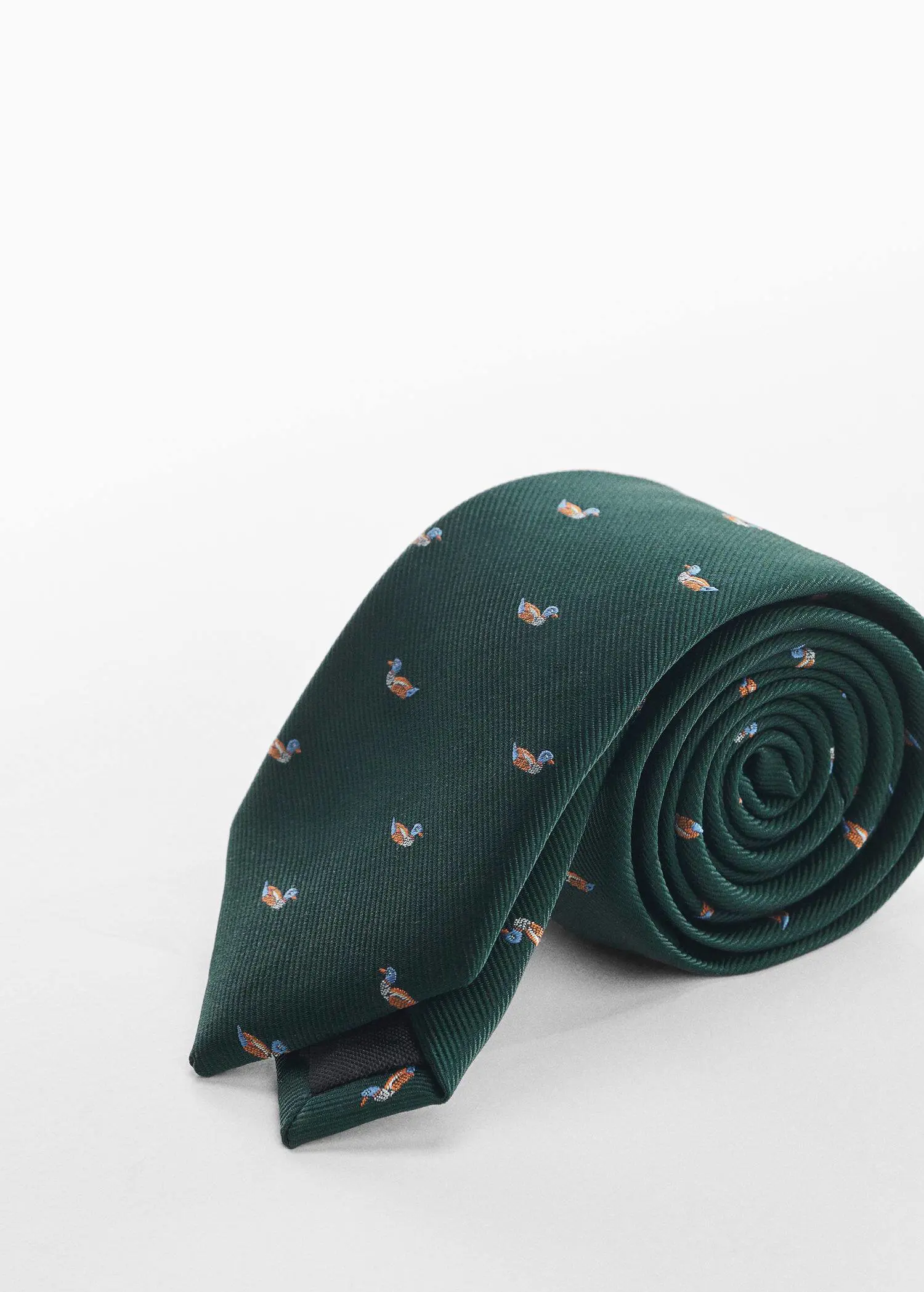 Mango Floral print tie. a close up of a tie on a white surface 