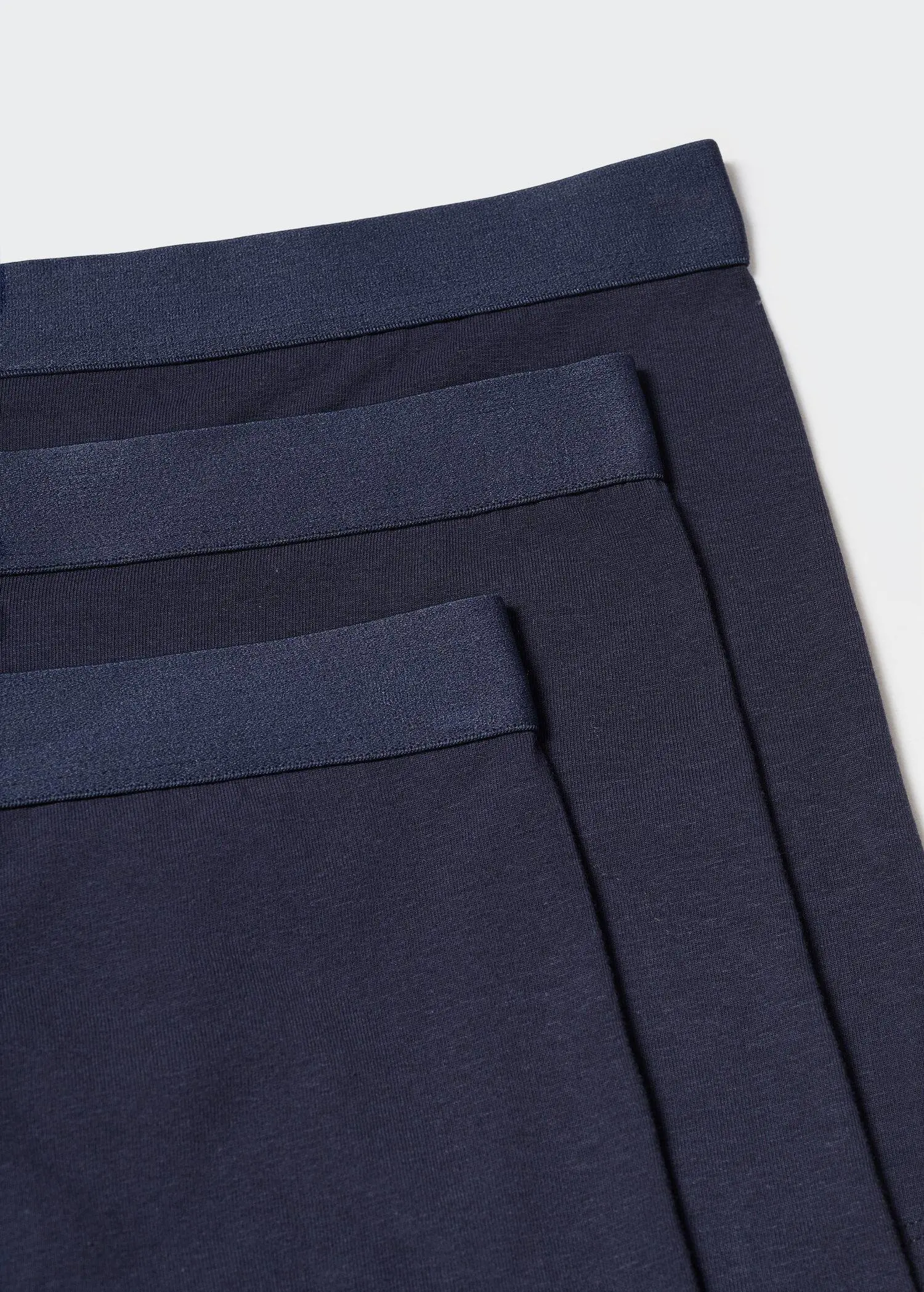 Mango 3-pack of blue cotton boxer shorts. a close up of a pair of pants 