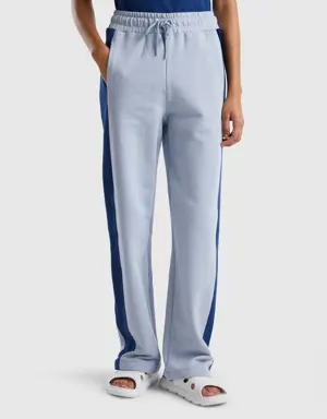 sky blue trousers with dark blue band
