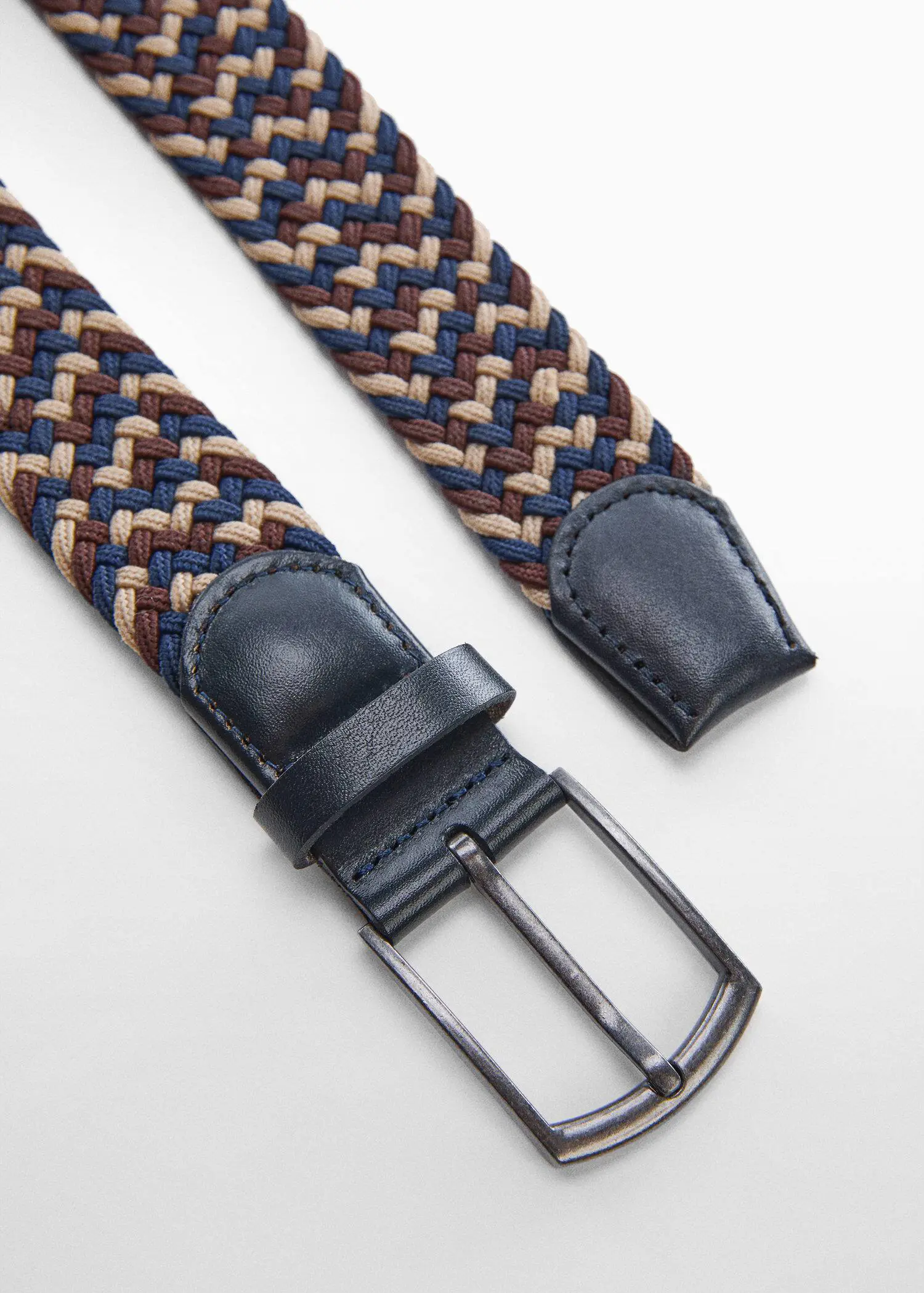 Mango Braided elastic coloured belt. a close-up of a belt on a white surface. 