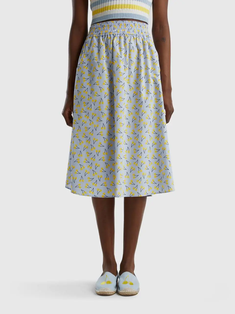 Benetton sky blue skirt with cherry pattern. 1