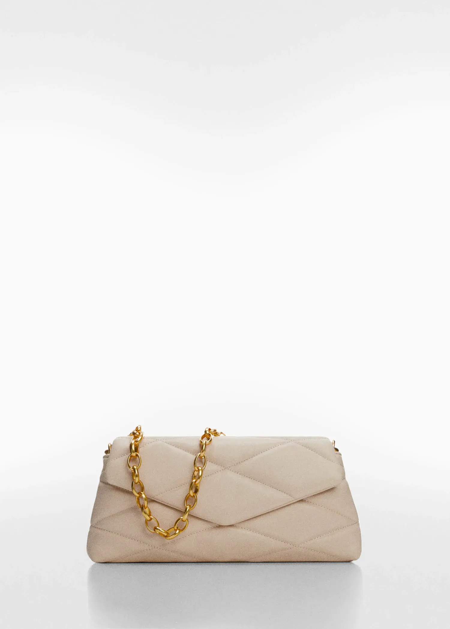 Mango Quilted bag with chain handle. a white purse with a gold chain hanging from it. 