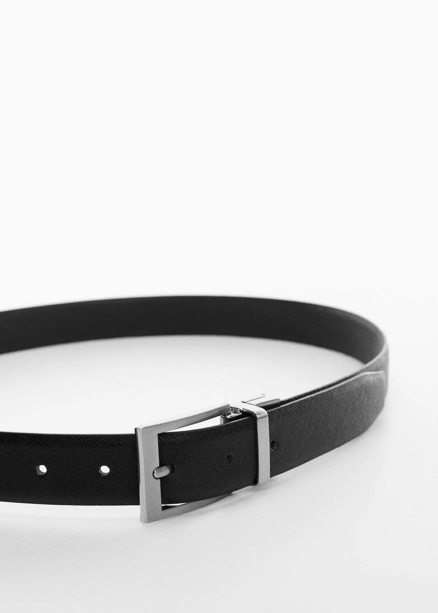 Mango Saffiano leather tailored belt. a close-up of a black leather belt with a silver buckle. 
