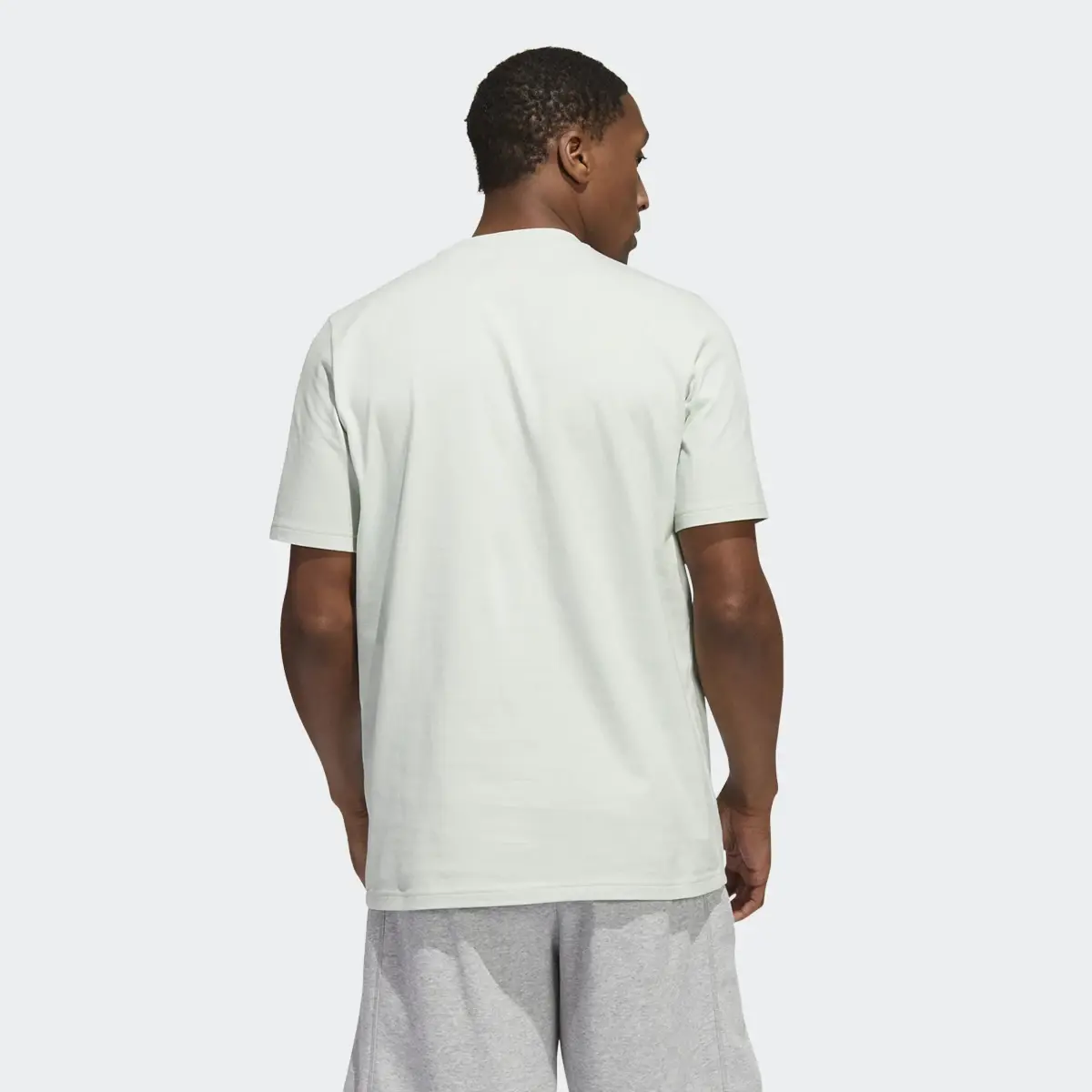 Adidas Dynamic Sport Graphic Pocket Tee. 3