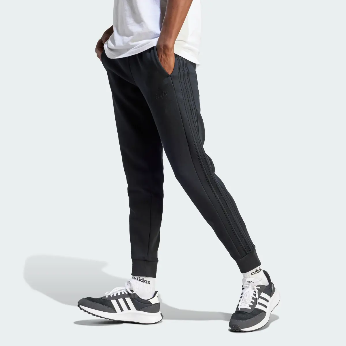 Adidas Essentials Fleece 3-Stripes Tapered Cuff Pants. 1