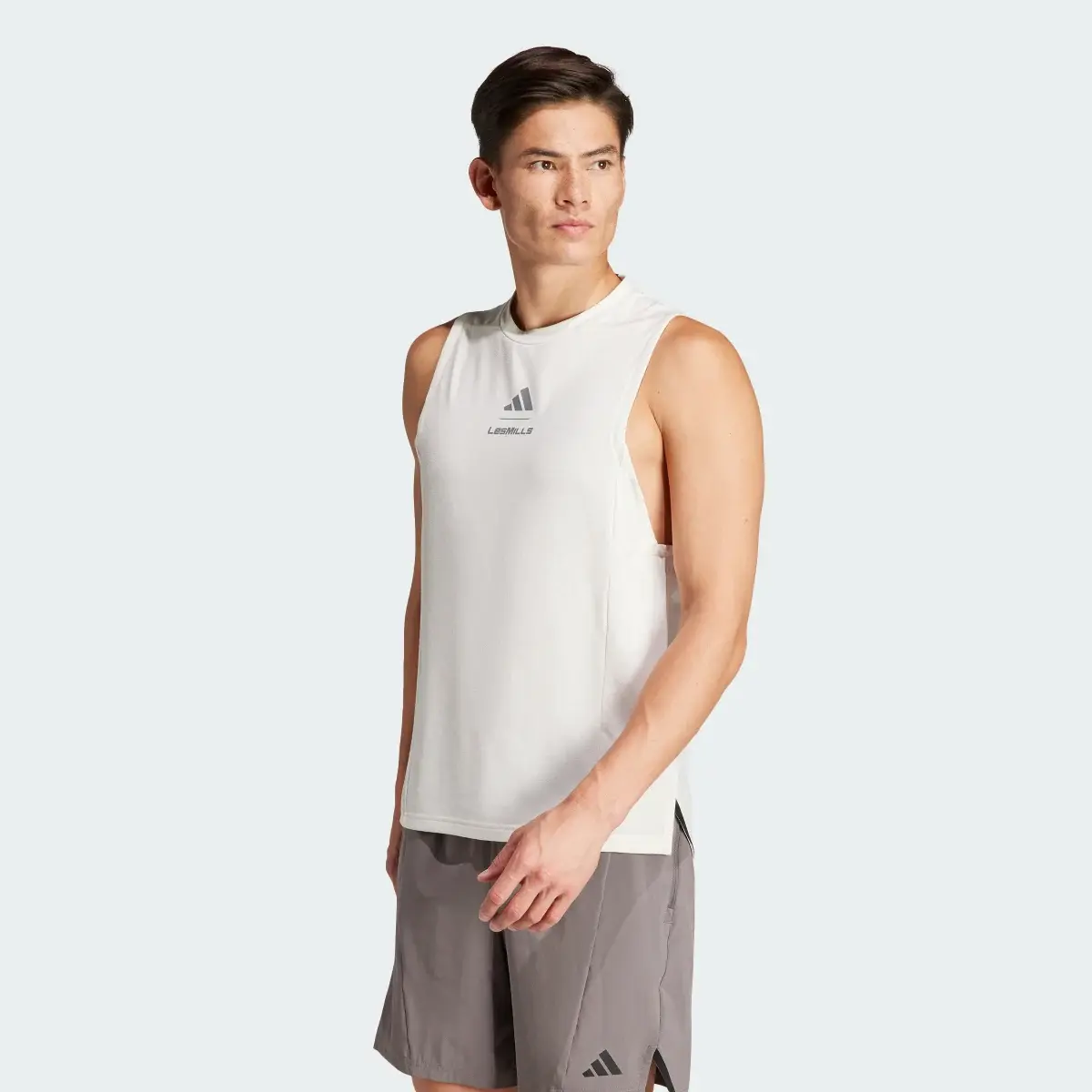 Adidas Les Mills Graphic Tank Top. 1