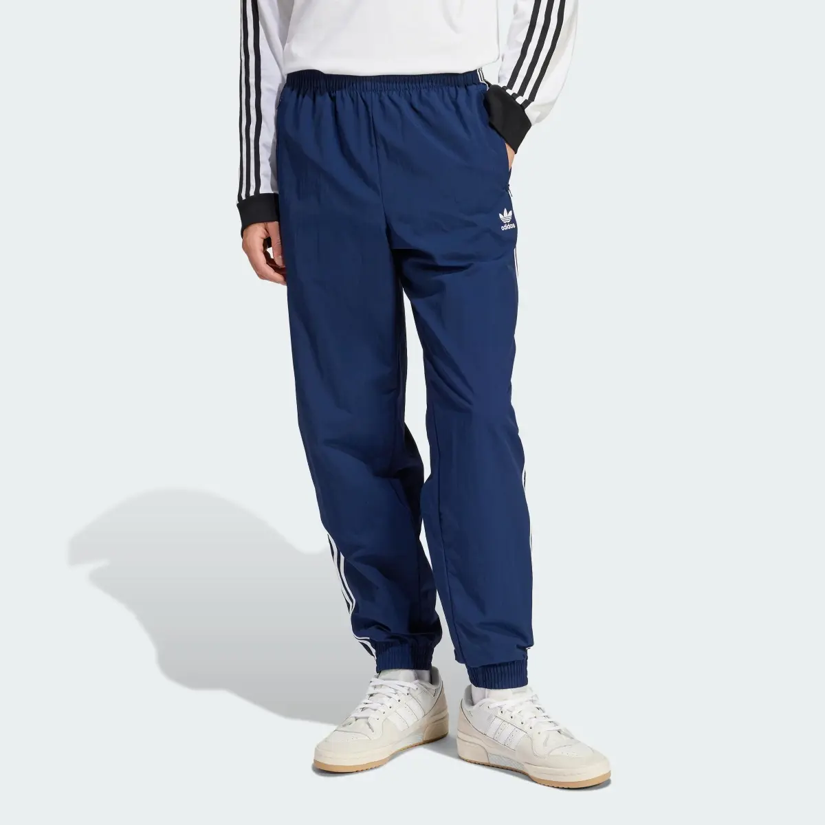 Adidas Adicolor Woven Firebird Track Pants. 1