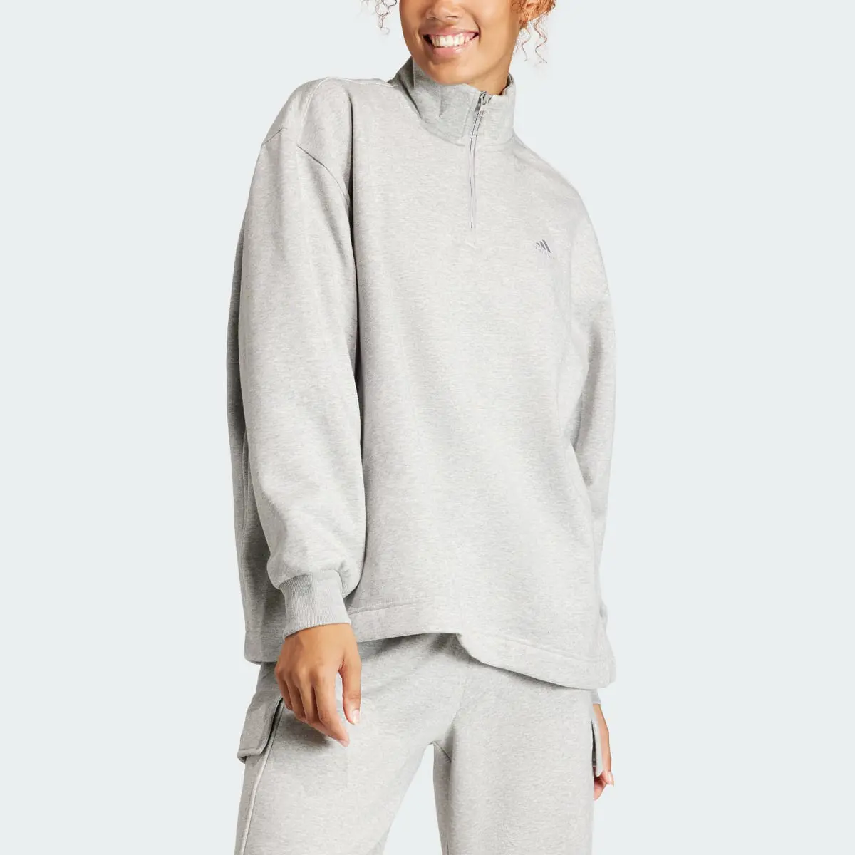 Adidas ALL SZN Fleece Quarter-Zip Sweatshirt. 1