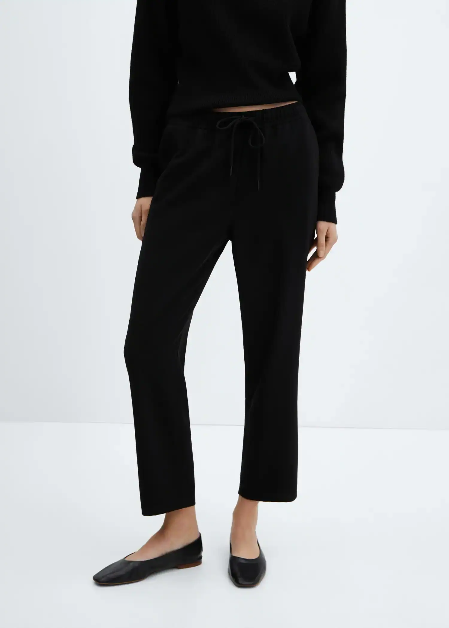 Mango Flowy straight-fit trousers with bow. 1