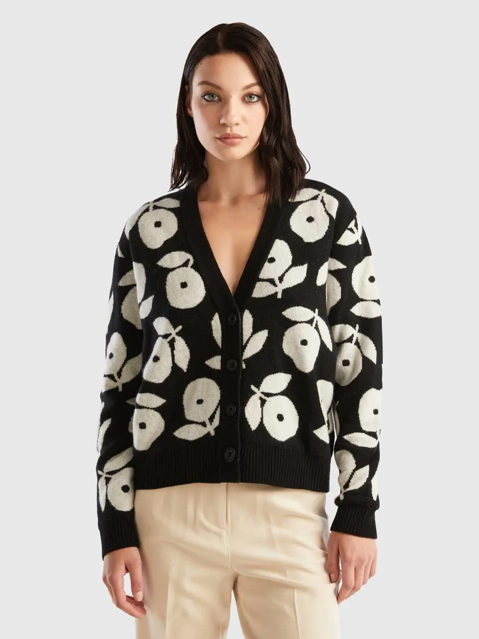 Benetton cardigan with floral inlays. 1