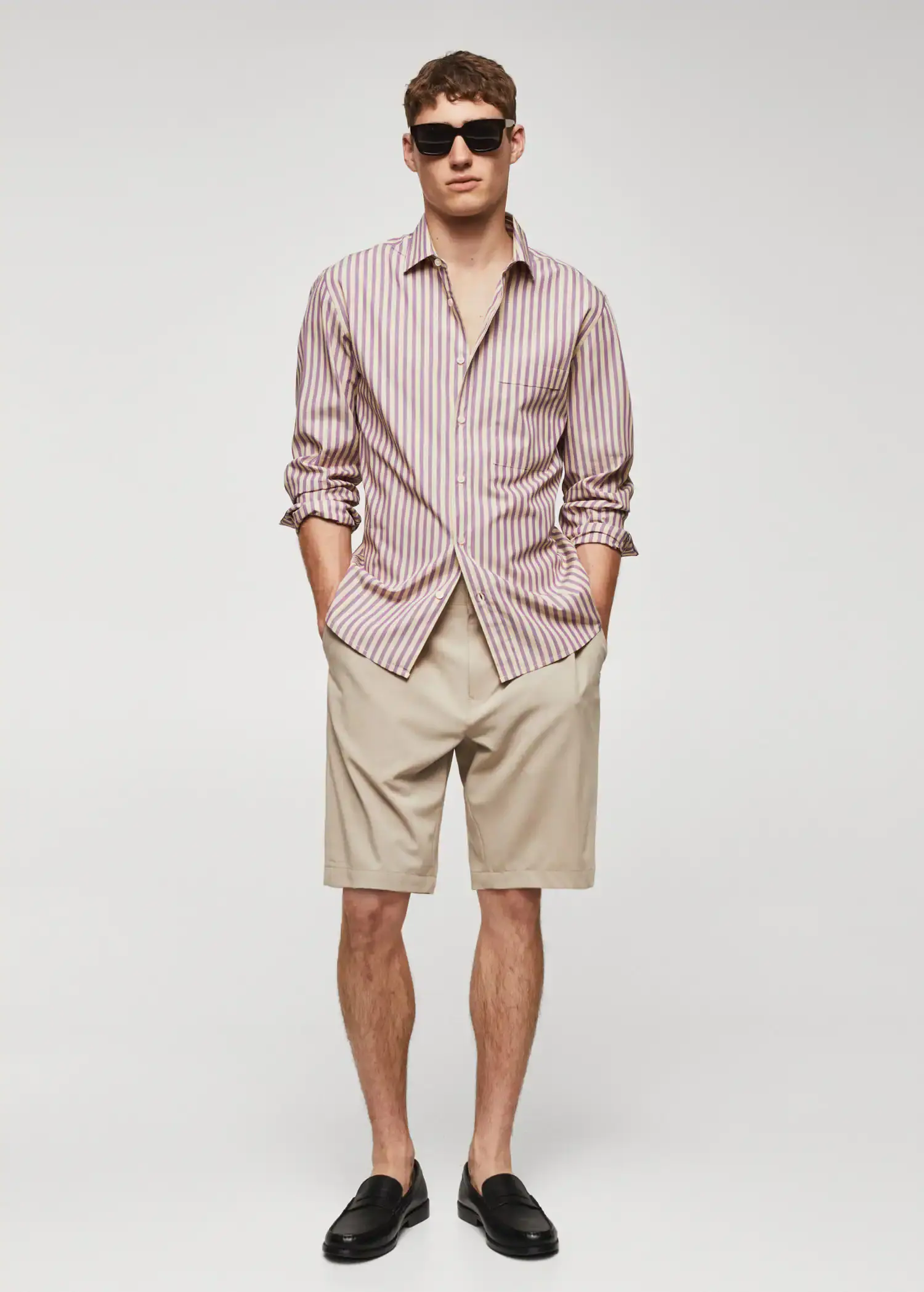 Mango 100% cotton Kodak striped shirt . a man in shorts and a striped button up. 