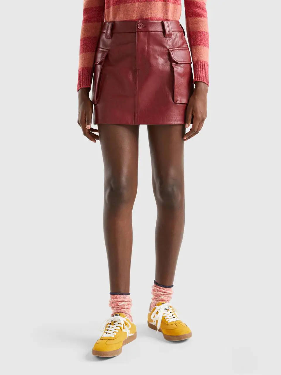 Benetton cargo mini skirt in imitation leather. 1