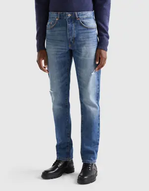 straight leg jeans with tears