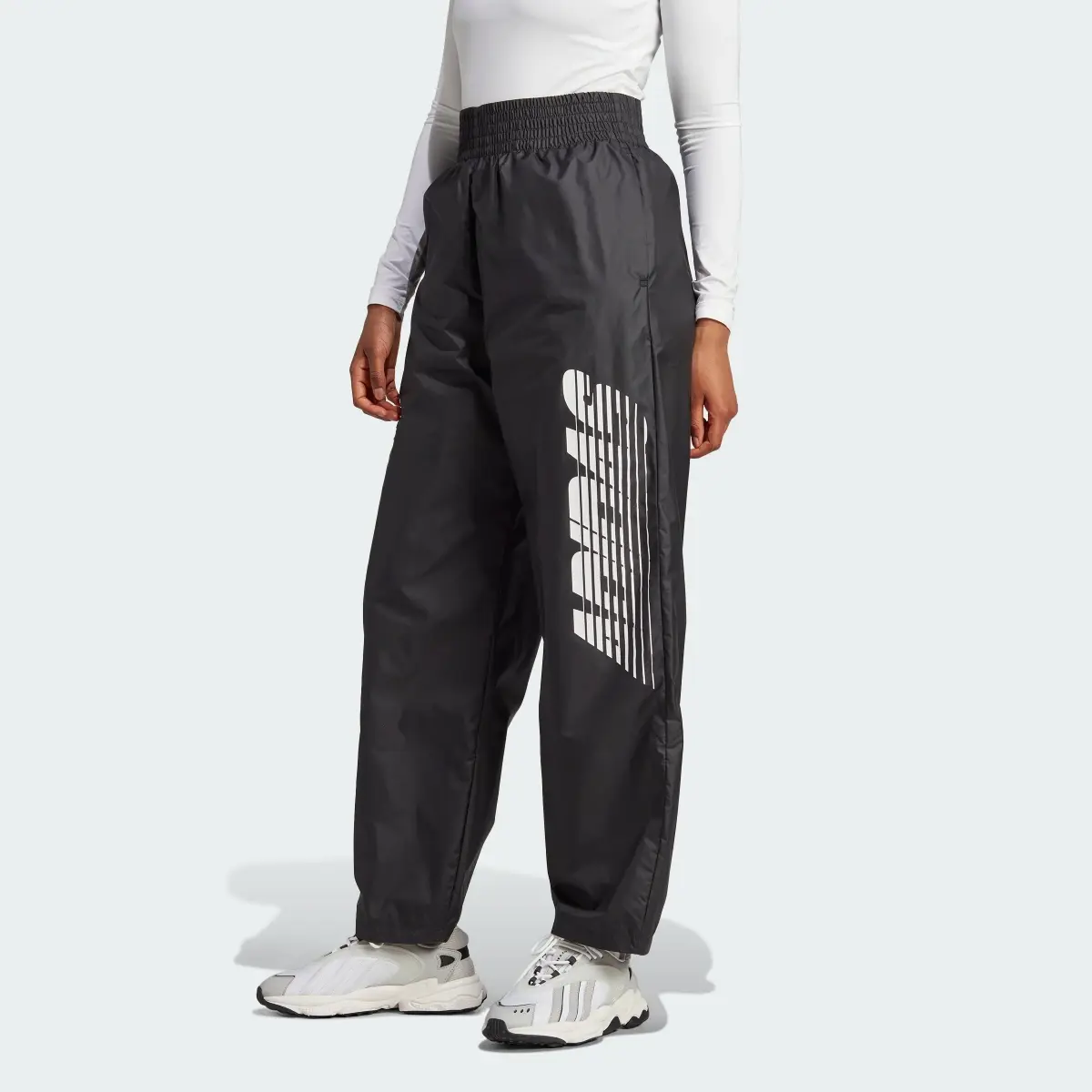 Adidas Side Leg Graphics Track Pants. 1