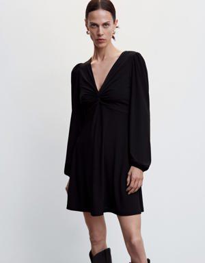 Black dress with knot detail