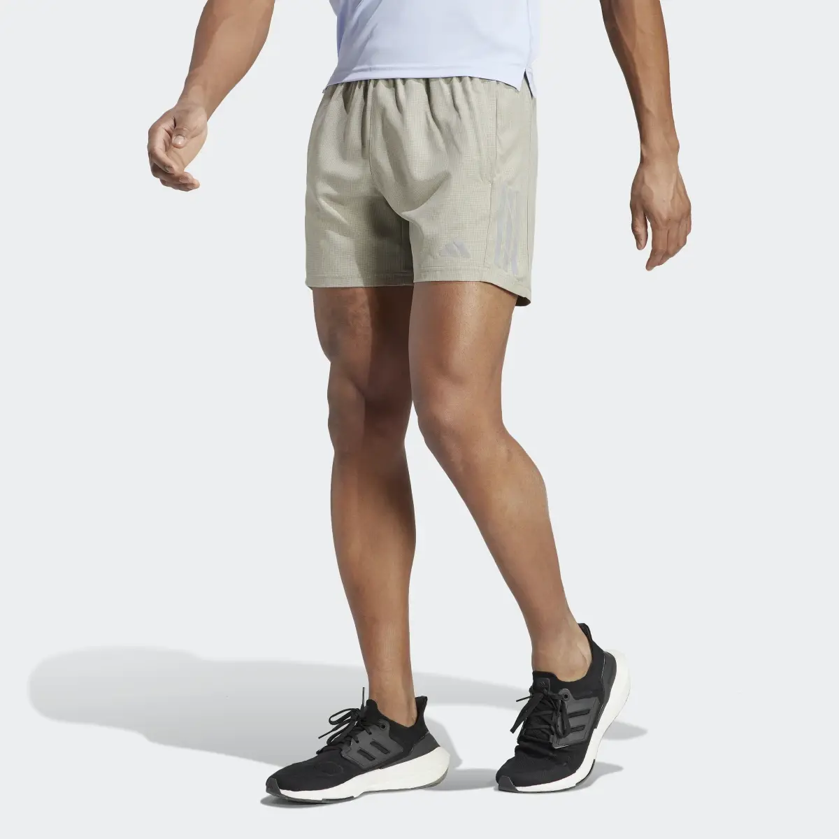 Adidas Own the Run Heather Shorts. 1