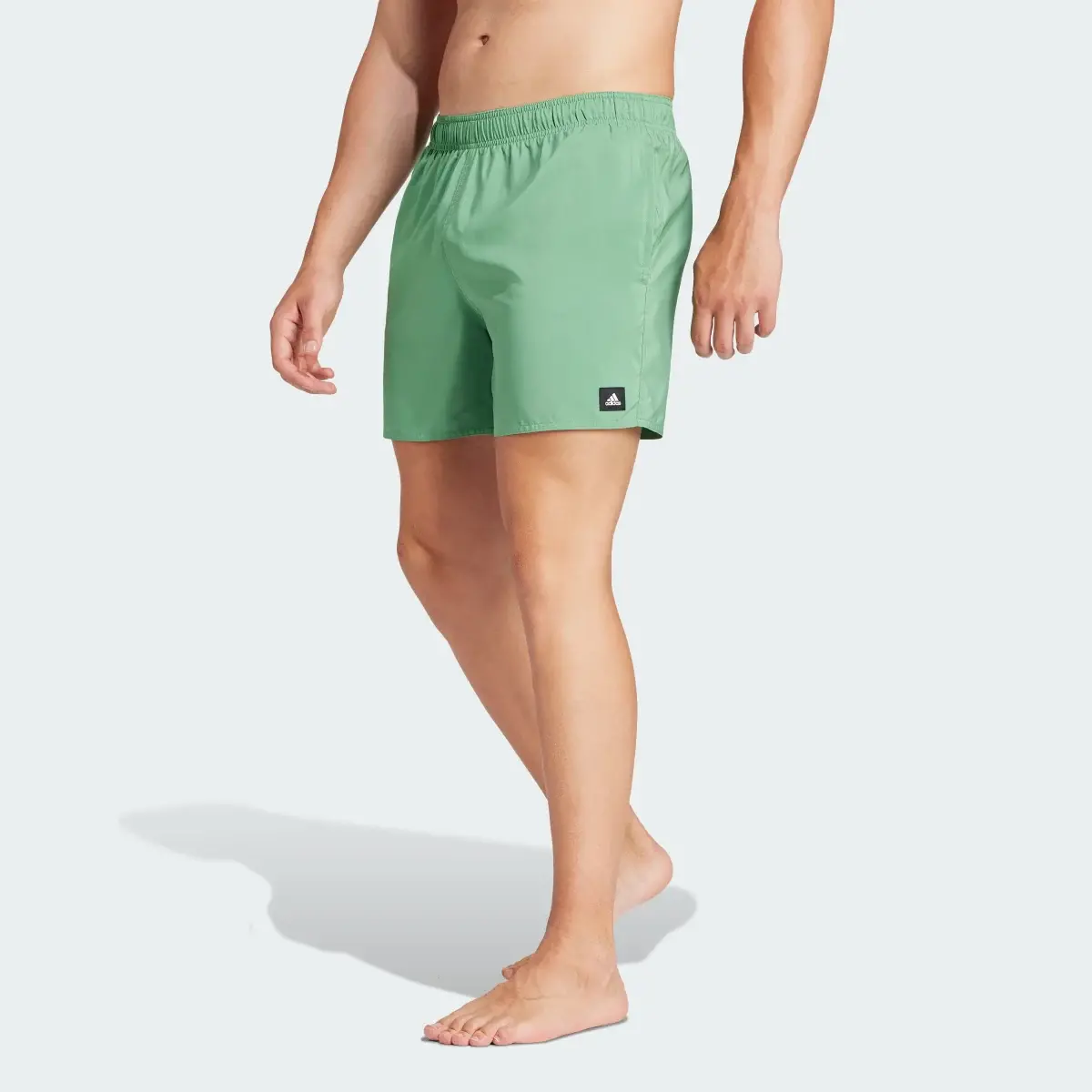 Adidas Solid CLX Short-Length Swim Shorts. 1